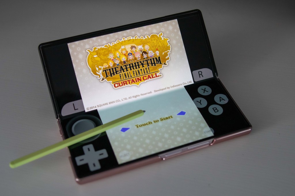 Samsung Fold 6 open in "Book mode" showing a 3DS game.